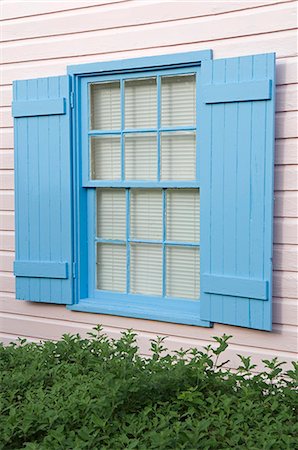 Brightly painted staff cottages Downtown on Little Whale Cay Stock Photo - Rights-Managed, Code: 862-03289320