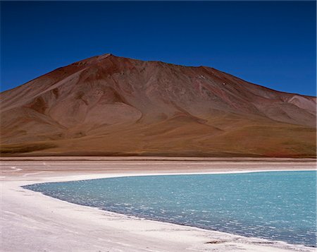 simsearch:862-03289455,k - The striking turquoise waters of Laguna Verde. The distinctive green colour of this high altitude lagoon is due to the high concentration of arsenic and other minerals in the water. Stock Photo - Rights-Managed, Code: 862-03289451