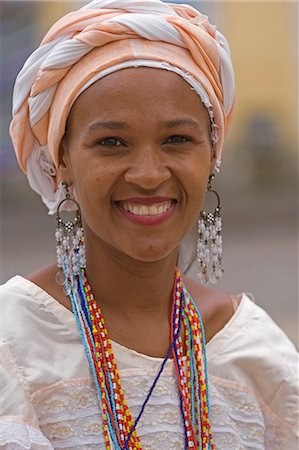 Local lady wearing traditional Bahian dress reflecting the area's colonial past in the UNESCO city of Salvador da Bahia,North East Brazil Stock Photo - Rights-Managed, Code: 862-03289683