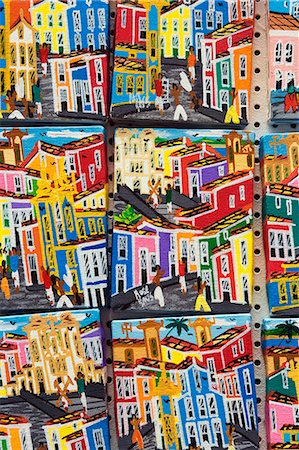 Brazil,Bahia,Salvador. The city of Salvador within the historic Old City,a UNESCO World Heritage listed location. Local art reflects the strong African influence with vibrant colours and traditional cultural scenes. Stock Photo - Rights-Managed, Code: 862-03289755