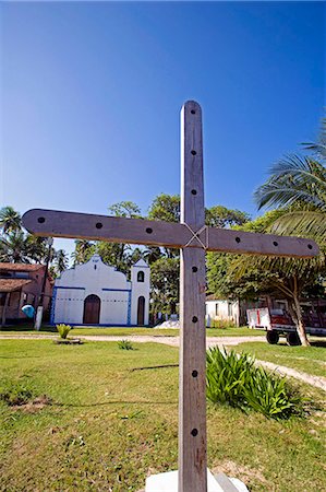 simsearch:862-03289687,k - Brazil,Bahia,Tinhare Island,Tinhare Archipelago. A small catholic church with a wooden cross outside is typical of the small chapels that service the villages along the coast of Tinhare Island. Stock Photo - Rights-Managed, Code: 862-03289774