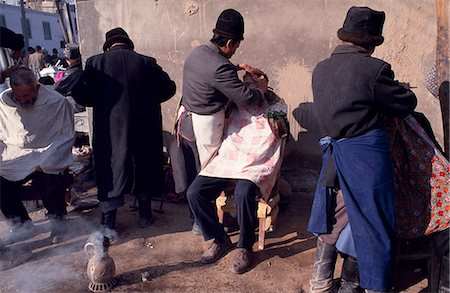 provincia di xinjiang - The Barber's section,Kashgar market. Fotografie stock - Rights-Managed, Codice: 862-03289839