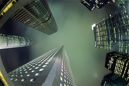 sky scraper fisheye - Gratte-ciel penchez-vous au-dessus du quartier affaires de Central sur l'île de Hong Kong. Photographie de stock - Rights-Managed, Code: 862-03289983