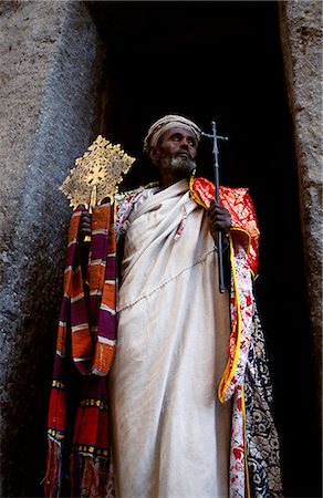 simsearch:862-03354017,k - A priest holds a pair of the monastery's many ancient crosses. Foto de stock - Con derechos protegidos, Código: 862-03354017