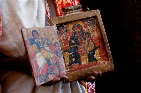 simsearch:862-03354009,k - A priest holds one of the monastery's ancient illuminated texts. Stock Photo - Rights-Managed, Code: 862-03354020