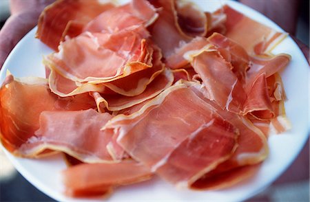 A plate of cured ham Stock Photo - Rights-Managed, Code: 862-03354203