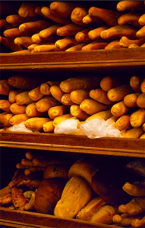 Freshly baked loaves of bread,baguettes and croissantes in a bakery Stock Photo - Rights-Managed, Code: 862-03354235