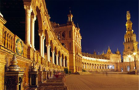 simsearch:862-08705015,k - The vast semi-circular Plaza de España in Seville. The grand buildings,fountains and tilework of the complex were constructed for the 1929 Spanish Americas fair. Stock Photo - Rights-Managed, Code: 862-03354493