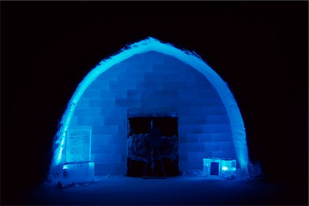 Main entrance to the Ice Hotel sign,carved in ice,at night time in front of the Ice Hotel in Kiruna. Arctic Circle,Northern Sweden. Stock Photo - Rights-Managed, Code: 862-03354646