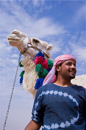 simsearch:862-03360160,k - A jockey prepares for the camel races at Palmyra,Syria. The races are held every year as part of the Palmyra Festival. Stock Photo - Rights-Managed, Code: 862-03354840