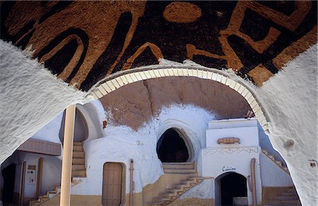 Tunisie, Matmata. Converti à partir d'une des maisons de la ville troglodyte célèbre fosse, le Sidi Driss hôtel conserve encore des parties des plateaux de tournage de Star Wars. Photographie de stock - Rights-Managed, Code: 862-03355031