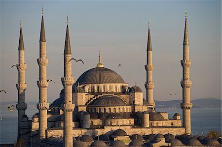 The Blue Mosque,Istanbul,also known as the Sultanhamet Mosque,gives its name to the surrounding area. Built under Sultan Ahmet (1603-1617AD) and designed by Mehmet Aga. Stock Photo - Rights-Managed, Code: 862-03355073