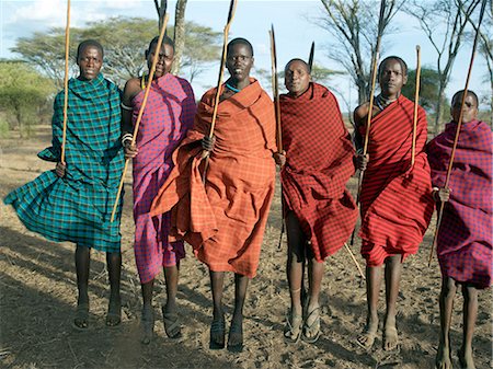 dancing tribal - Young Datoga men jump high in the air during a dance. The Datoga (known to their Maasai neighbours as the Mang'ati and to the Iraqw as Babaraig) live in northern Tanzania and are primarily pastoralists. Stock Photo - Rights-Managed, Code: 862-03355233