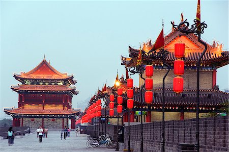 familiar sight - City wall and towers built during the first reign of Hongwu,the first Emperor of the Ming dynasty,Xian City,Shaanxi Province,China Stock Photo - Rights-Managed, Code: 862-03351091