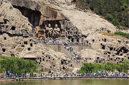 simsearch:862-03351117,k - Statues de Bouddha sculptées dans les grottes de Longmen, Dragon Gate grottes sur la Yi il River, Province du Henan, Chine Photographie de stock - Rights-Managed, Code: 862-03351150