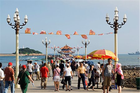 China,Shandong Province,Qingdao City. Huilan Pavilion seaside beach resort and host of the sailing events of the 2008 Olympic Games. Stock Photo - Rights-Managed, Code: 862-03351178