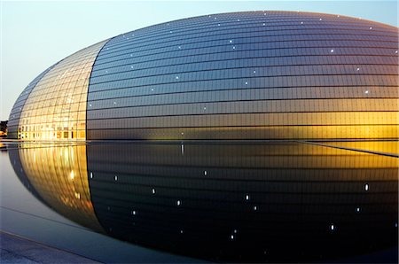 simsearch:862-03351425,k - China,Beijing. The National Grand Theatre Opera House also known as The Egg designed by French architect Paul Andreu and made with glass and titanium (opened Sept 25th 2007). Stock Photo - Rights-Managed, Code: 862-03351237