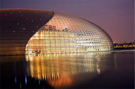 simsearch:862-03351425,k - China,Beijing. The National Grand Theatre Opera House also known as The Egg designed by French architect Paul Andreu and made with glass and titanium (opened Sept 25th 2007). Stock Photo - Rights-Managed, Code: 862-03351238