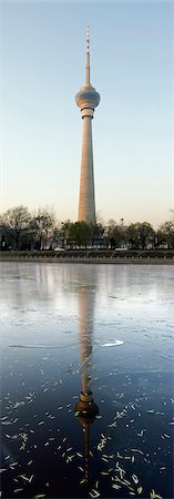 simsearch:862-08700169,k - China,Beijing. The CCTV (China Central Television) tower reflected in the river at Yuyuantan Park. Stock Photo - Rights-Managed, Code: 862-03351315