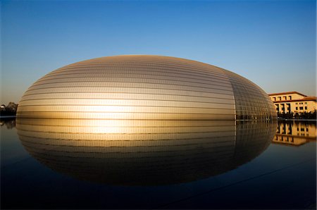 ellipse building - China,Beijing. The National Grand Theatre Opera House known as The Egg and designed by French architect Paul Andreu. Stock Photo - Rights-Managed, Code: 862-03351424