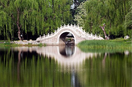 east asia - China,Beijing. Old Summer Palace - an arched stone bridge. Stock Photo - Rights-Managed, Code: 862-03351457