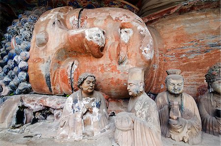 China,Chongqing Municipality,Dazu Rock Sculptures Unesco World Heritage site. The 31-metre-long 'Sakyamuni Entering Nirvana' sleeping Buddha Stock Photo - Rights-Managed, Code: 862-03351668