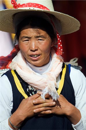 simsearch:862-03289833,k - China,Yunnan province,Dali Town. A Bai woman at the San yue jie Third Moon Festival Fotografie stock - Rights-Managed, Codice: 862-03351720