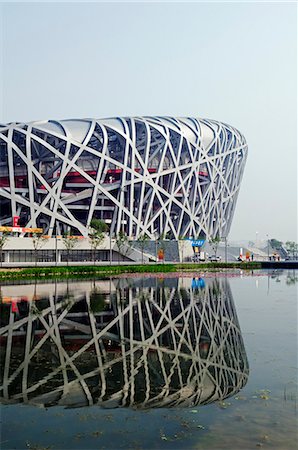 Chine, Beijing. Le stade National de nid oiseaux conçu par Herzog & de Meuron Photographie de stock - Rights-Managed, Code: 862-03351809