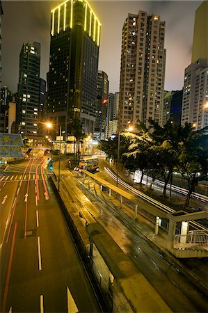 simsearch:862-03351951,k - Chine, Hong Kong, Causeway Bay du centre de la ville éclairé la nuit par des feux de circulation, les tramways et les rue Photographie de stock - Rights-Managed, Code: 862-03351950