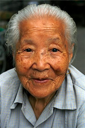 China,Beijing. Old Womanin Beijing Hutong near the Drum and Bell Tower. Stock Photo - Rights-Managed, Code: 862-03351953