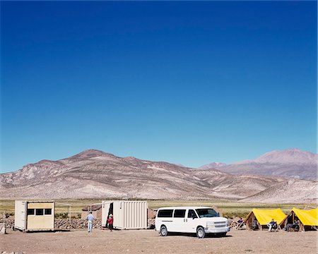 Camping in style. At Explora's Camp in Parque Nacional Volcan Isluga two shipping containers have been converted,one into a kitchen and dining room and the other into a bathroom block to be provide comfort in the wilderness. Stock Photo - Rights-Managed, Code: 862-03352132