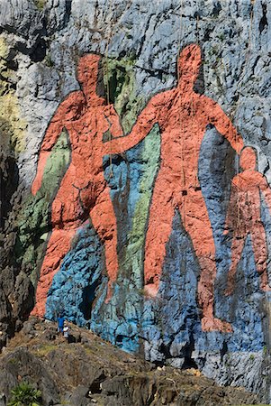 Cuba,Vinales. Mural de la Prehistoria. A mural of evolution commissioned by Fidel Castro in 1960's,Mogote dos Hermanas Stock Photo - Rights-Managed, Code: 862-03352591