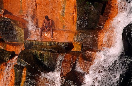 Caribbean,Dominica,Trafalgar Falls. Dominica is a mountainous island of volcanic origin of the Lesser Antilles in the Caribbean,south of Guadeloupe and north of Martinique. Explored by Columbus in 1493,Dominica was claimed by Britain and France until 1763,when it was formally ceded to Britain. Stock Photo - Rights-Managed, Code: 862-03352665