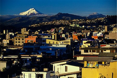 ecuador capital city pictures - Sunrise on the city and Cotapaxi Volcano,Quito Stock Photo - Rights-Managed, Code: 862-03352673