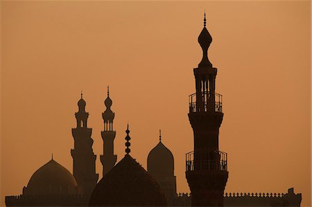 Les minarets de la mosquée de Sultan Hassan splendide silhouetté au coucher du soleil, le Caire, Egypte Photographie de stock - Rights-Managed, Code: 862-03352857