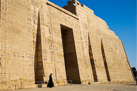 ramses iii - The impressive First Pylon of the wonderfully preserved mortuary temple of Ramses III at Medinet Habu on the West Bank,Luxor,Egypt Stock Photo - Rights-Managed, Code: 862-03352903