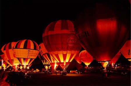 'Night Glow' of illuminated hot air balloons at the International Balloon Fiesta Bristol. Stock Photo - Rights-Managed, Code: 862-03353011