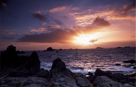 simsearch:862-03361435,k - The rocky promontory at Droppy Nose Point,Bryher in the evening. Fotografie stock - Rights-Managed, Codice: 862-03353021