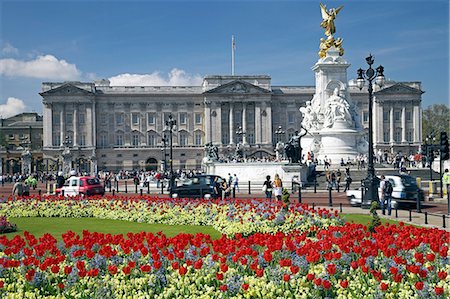 Buckingham Palace is the official London residence of the British monarch. The palace,originally known as Buckingham House (and still nicknamed Buck House by the royal family),was a large townhouse built for the Duke of Buckingham in 1703 and entered into the possession of the royal family when acquired by King George III in 1762 as a private residence. Stock Photo - Rights-Managed, Code: 862-03353092