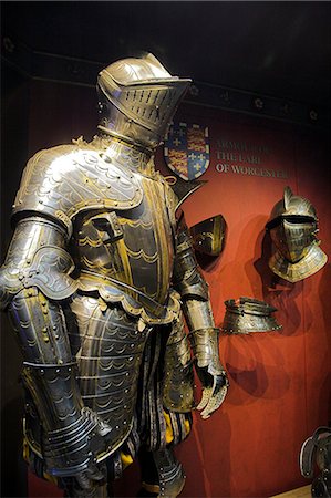 A suit of medieval armour on display inside the Tower of London. Stock Photo - Rights-Managed, Code: 862-03353166