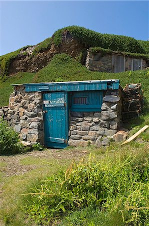 A small fisherman's hut tucked under the lee of the cliff at Cape Cornwall,England Stock Photo - Rights-Managed, Code: 862-03353327