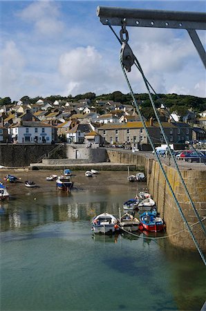 View of the Cornish fishing village of Mousehole from the harbour wall,Cornwall,England Stock Photo - Rights-Managed, Code: 862-03353342