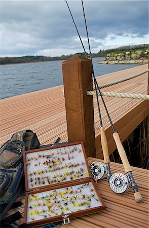 enniskillen - UK,Northern Ireland,Fermanagh. Fishing rods,flyboxes and net ready for Lough Erne. Fotografie stock - Rights-Managed, Codice: 862-03353375