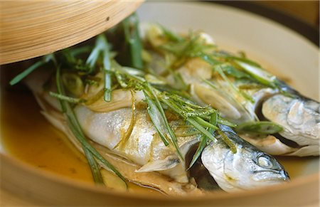 fish farm - England,Yorkshire,Yorkshire Dales. Farm River Trout prepared in a steamer. Stock Photo - Rights-Managed, Code: 862-03353476