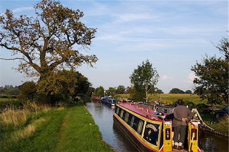 England,Shropshire,Whitchurch. Barges on a tranquil section of the Shropshire Union Canal. Stock Photo - Rights-Managed, Code: 862-03353788