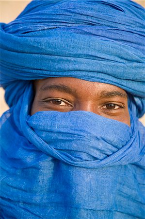 Timbuktu, Mali. Die Augen von einem Tuareg-Mann in seiner blauen Turban in Timbuktu. Stockbilder - Lizenzpflichtiges, Bildnummer: 862-03364251