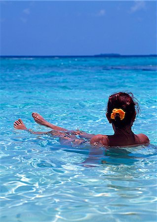 Woman relaxing in the water,Maldive Islands. Indian Ocean. . Stock Photo - Rights-Managed, Code: 862-03364469