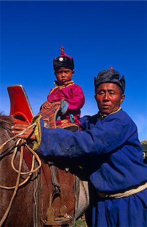 family horses - Mongolia,Karakorum. Horse herder (Arat) and his son on horseback. Stock Photo - Rights-Managed, Code: 862-03364521