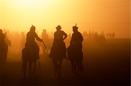 photos horse herders mongolia - Mongolia,Karakorum. Horse Herders returning home after a Horse Festival in Karakorum. Stock Photo - Rights-Managed, Code: 862-03364555