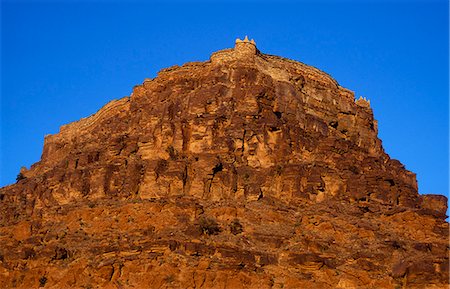 The Berber agadir,or fortified granary,of Amtoudi is built on a sheer bluff Stock Photo - Rights-Managed, Code: 862-03364581